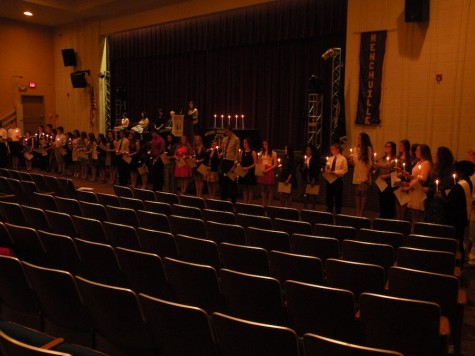 NHS Inductees light candles in tradition