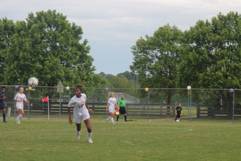 Senior, Semiyah Bellamy headed the ball to her teammate and advanced down the field.