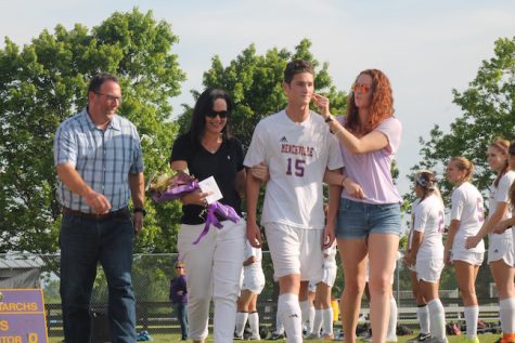 Senior, Cole Montgomery was escorted by his parents and sister. 