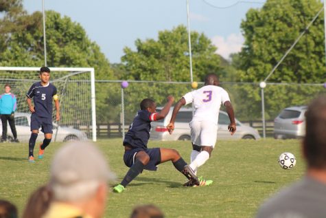 Senior Tre Bagby gains possession and advances down the field. 