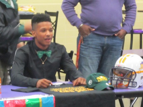 Malik Dixon signs his letter of intent to play collegiate level football for Norfolk State University.