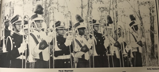 Circa 1992, "Marching band is an enjoyable experience because you learn to work well with others and to get things done under pressure. The reward comes with the reaction of the crowd."
-Amy Harmaturk