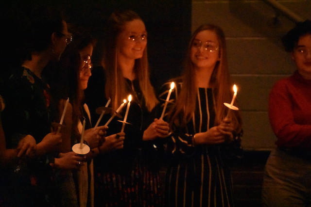 New members participated in the Society pledge and traditional candle lighting ceremony.