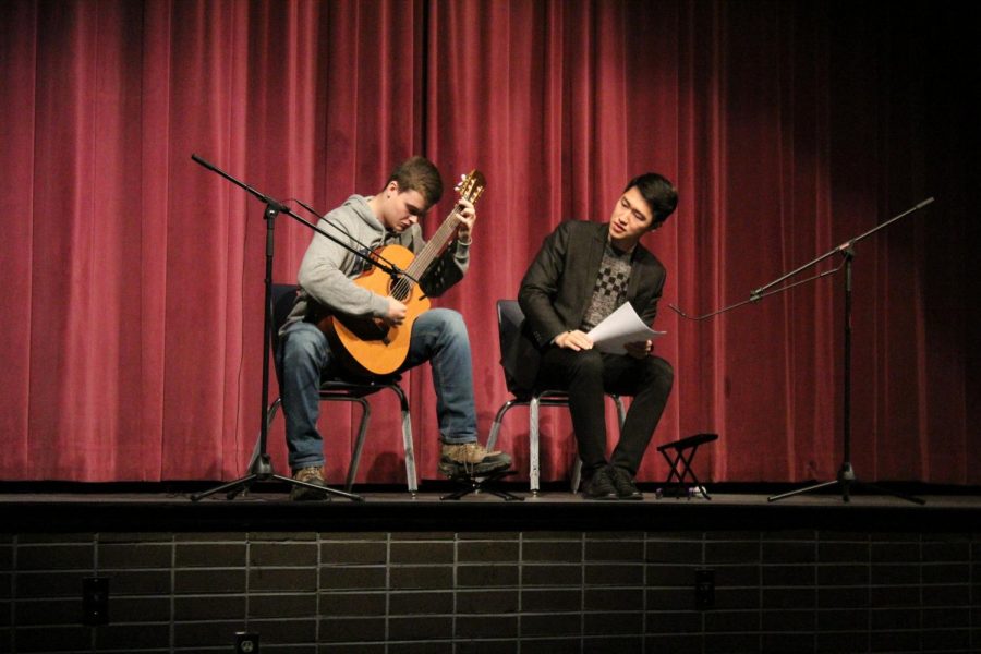 Sam Cornette plays a piece for Zhang in their masterclass session. 