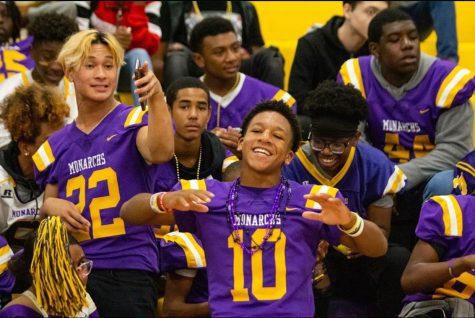 The hype for the homecoming game builds as Menchville football players dance during the pep rally.