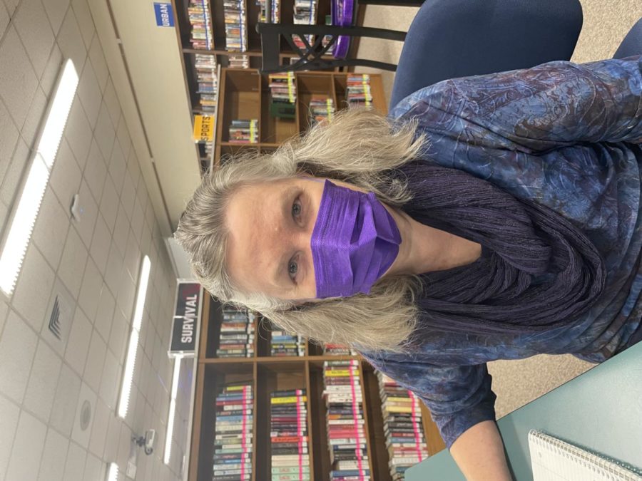 Mrs. Graham wearing her purple disposable mask