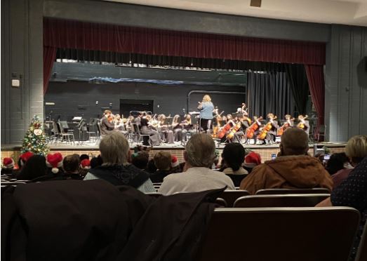 The Menchville Orchestra lead by Director Anna Moyer