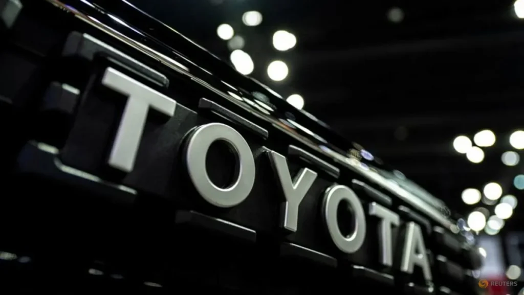Toyota Sienna Hybrid minivan parked outside a dealership