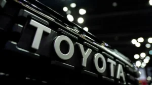 Toyota Sienna Hybrid minivan parked outside a dealership